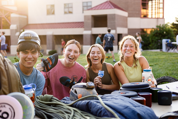 students at table outside