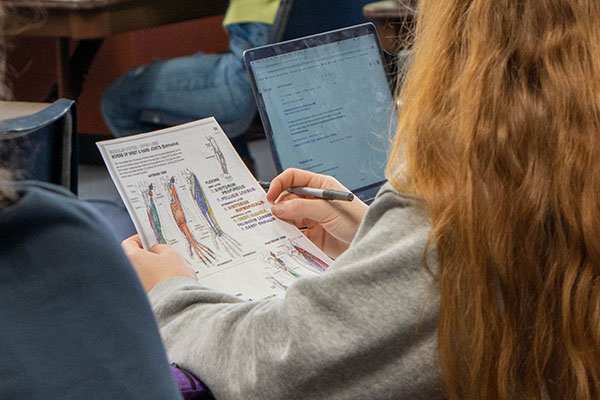 biology student in science class