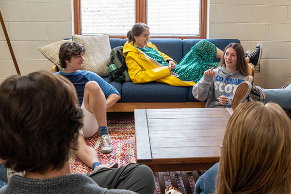 students in a group talking