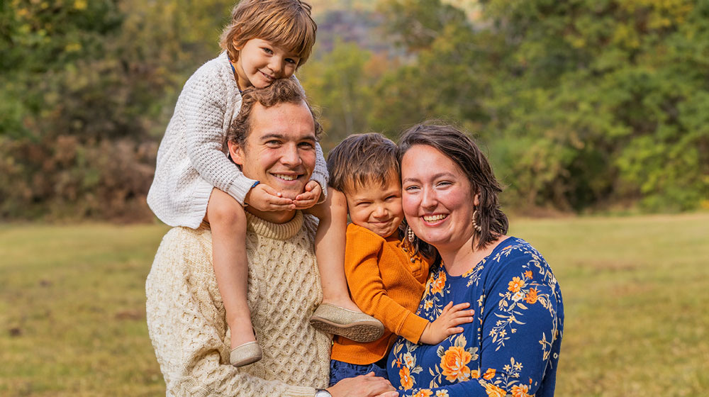 Family posed in field