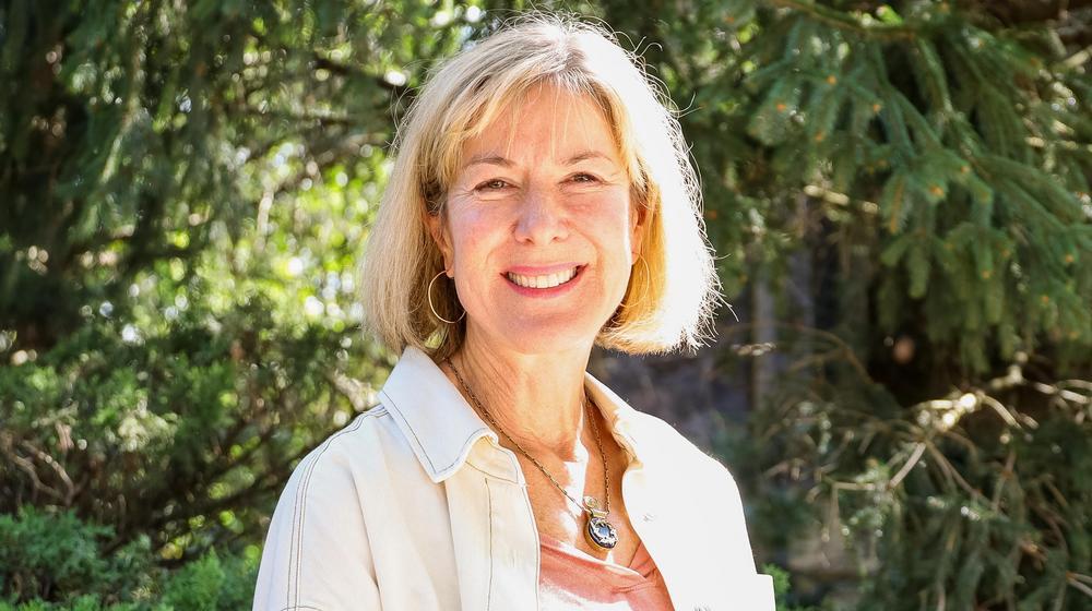 joanna taft smiling and standing in the sunlight
