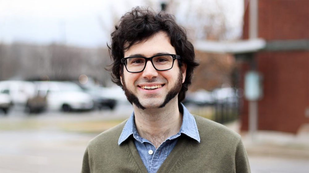 enoch ewell standing outside