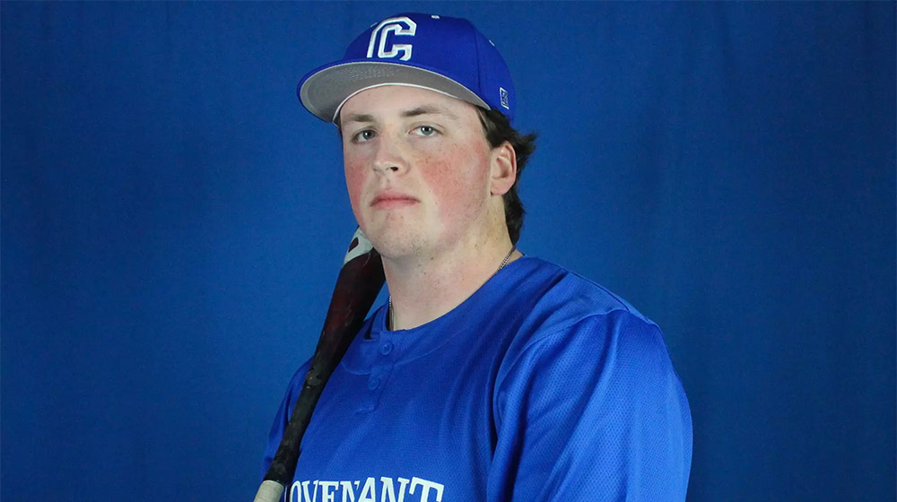 scotty holding a baseball bat