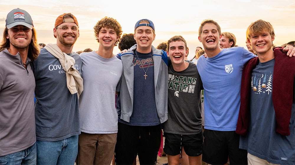 mac and his friends on a scenic overlook