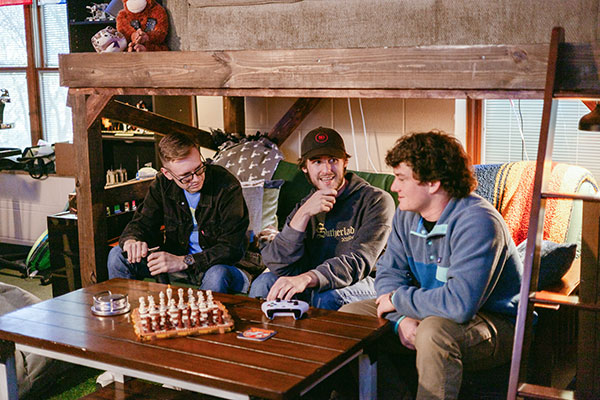 female student taking notes in class